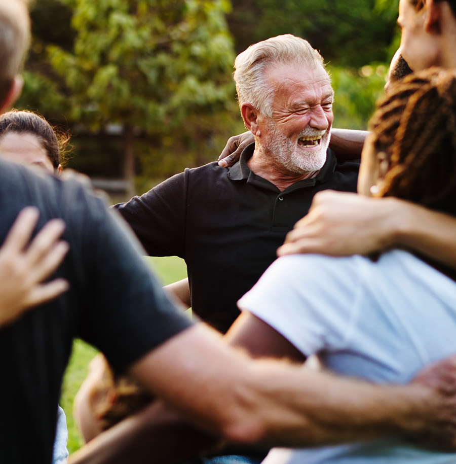 group of people in a huddle